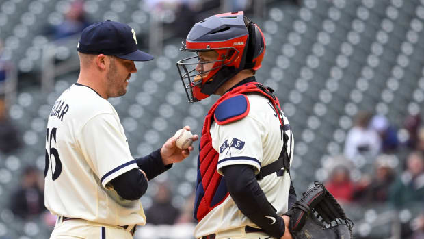Caleb Thielbar and Ryan Jeffers talk at the mound